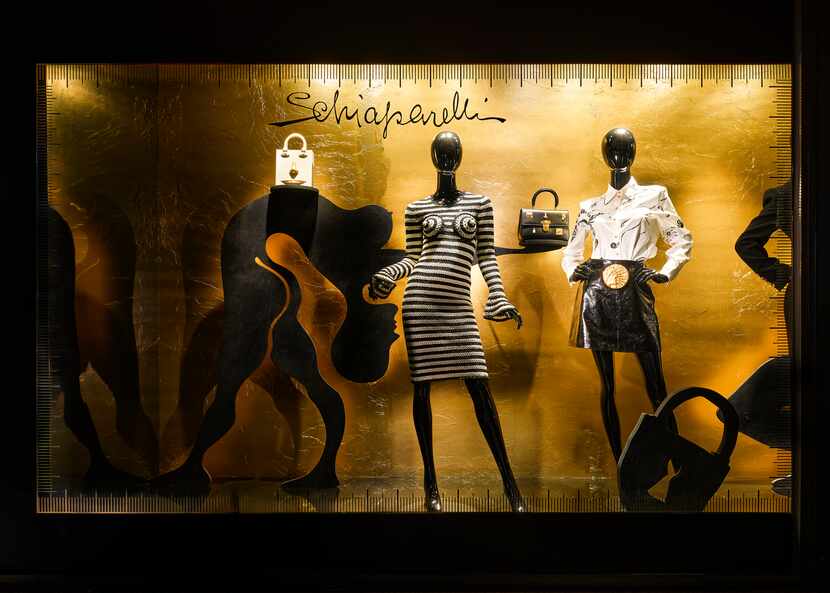 A display window featuring the Schiaparelli collection on the Commerce Street side of the...