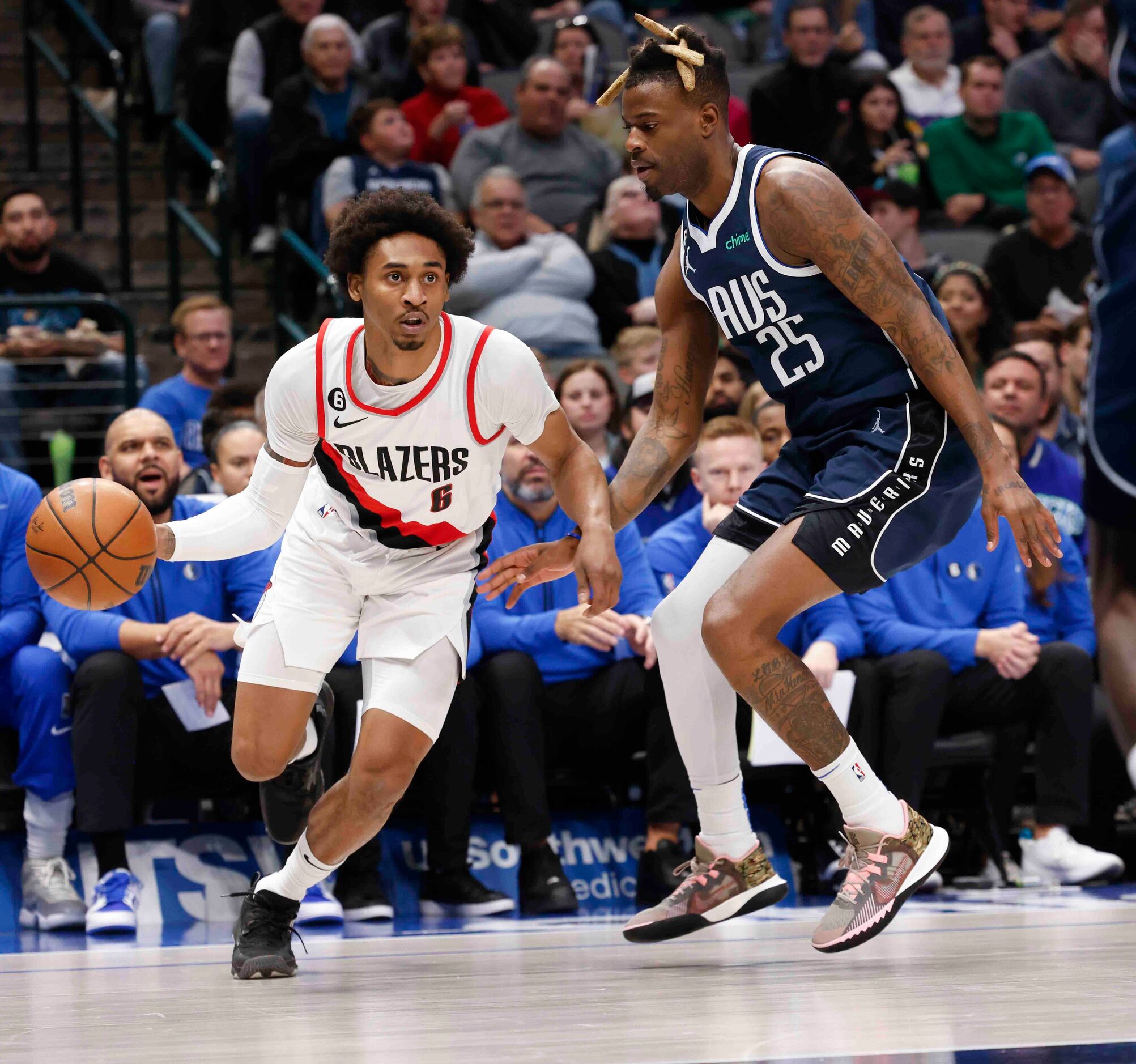 Portland Trail Blazers guard Keon Johnson (6) dribbles past Dallas Mavericks forward Reggie...