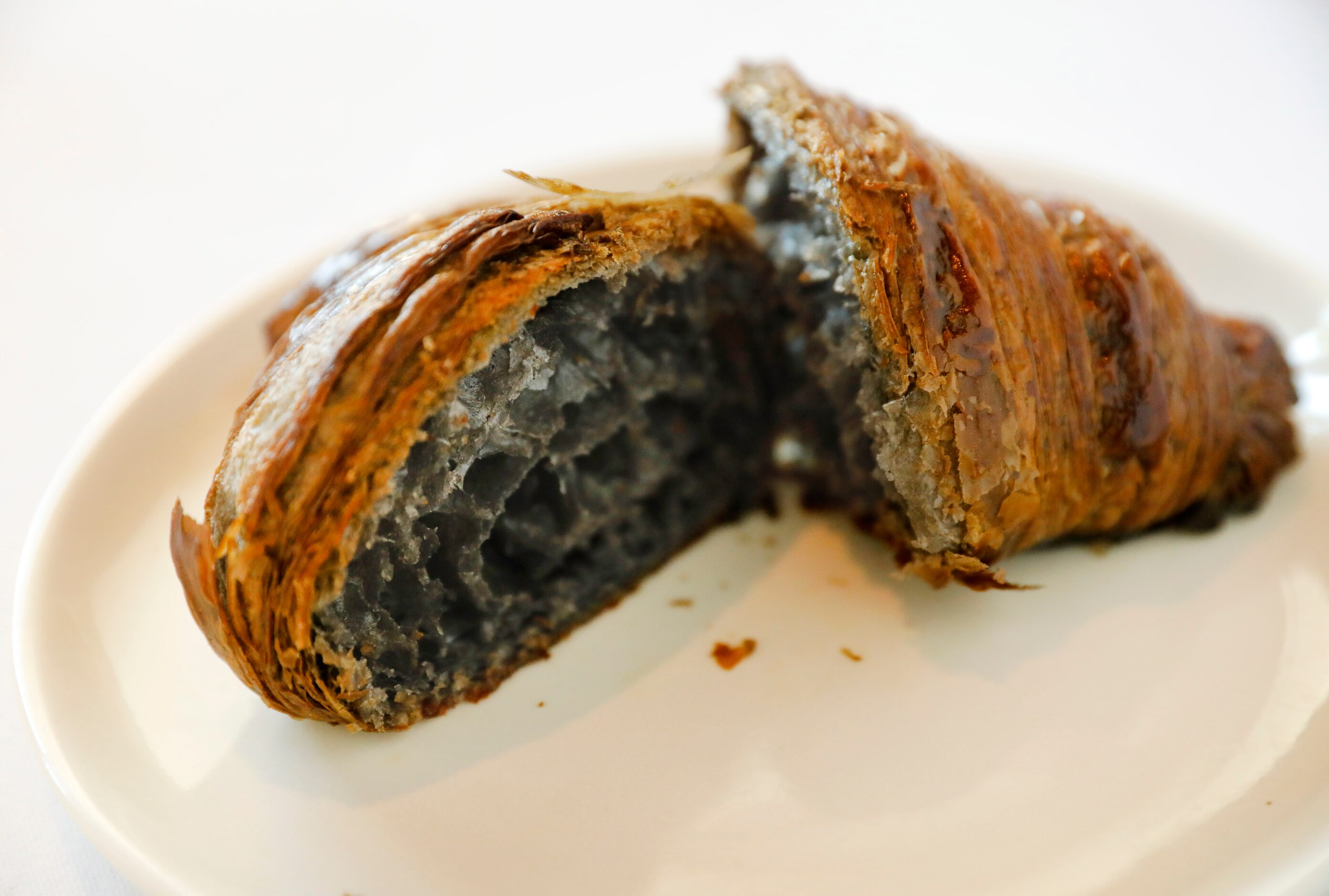 A burnt cinnamon croissant is on the dessert menu at Le PasSage, a super fancy restaurant...