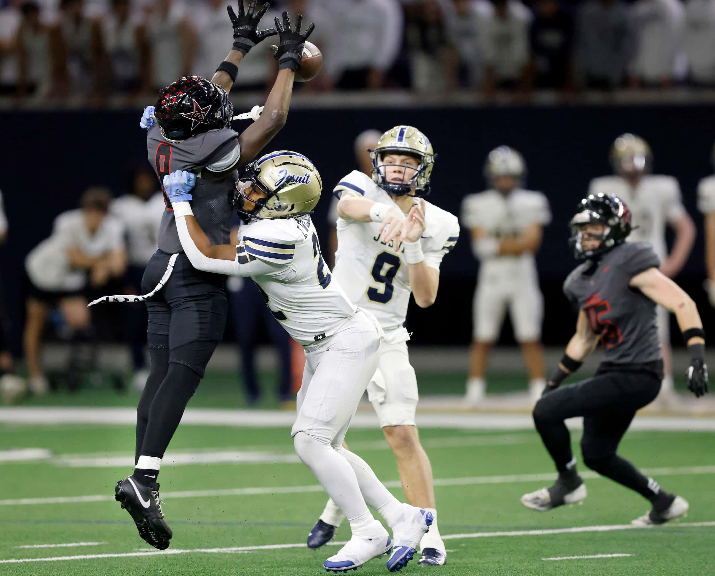 On fourth down, Coppell defensive back Jaden Adkins (8) blocks a pass by Jesuit quarterback...