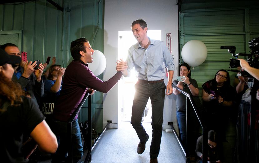 Democratic presidential candidate Beto O'Rourke greets audience members at Pimenta,...