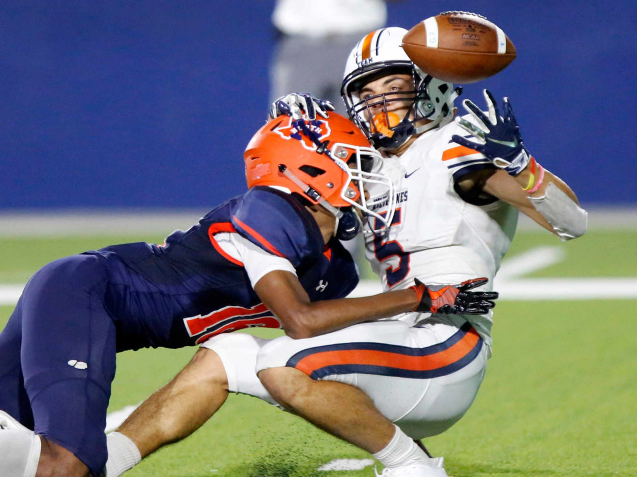 Wakeland High School wide receiver Kevin Rachel (5) appeared to have made a juggling catch...