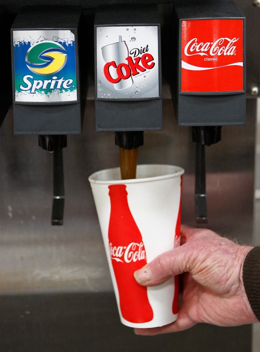 In this March 3, 2010 file photo, a Costco customer chooses Diet Coke at Costco in Mountain...