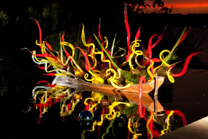 GLASSWORK OF CHIHULY ON DISPLAY IN THE WOMEN'S GARDEN AT THE DALLAS ARBORETUM FOR THE...