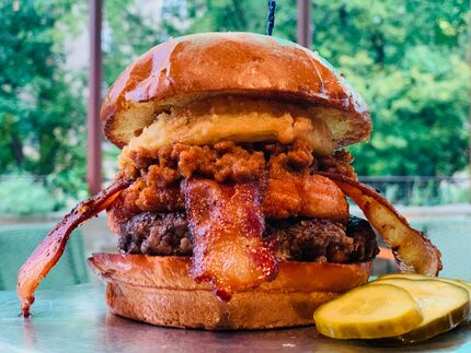 The Big Tex Burger at Rodeo Goat is serious: It's a 44 Farms beef patty, topped with a...