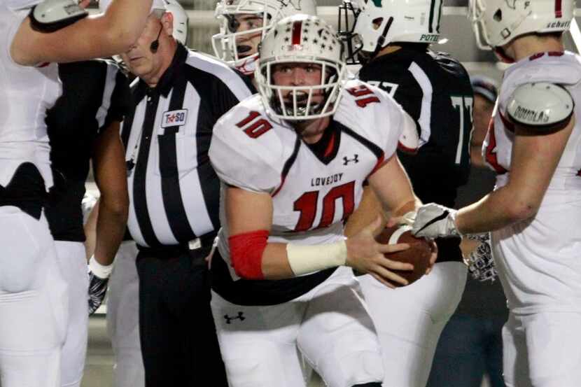 Lovejoy's Bumper Pool (10) celebrates his fumble recovery during the first quarter half of a...