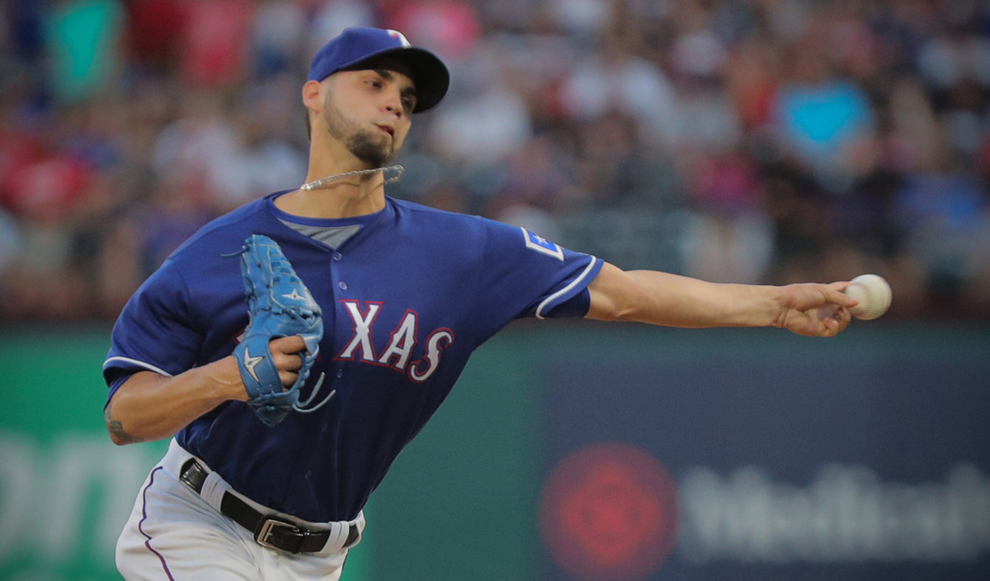 Texas Rangers relief pitcher Alex Claudio (58) pitches in the sixth inning as the New York...