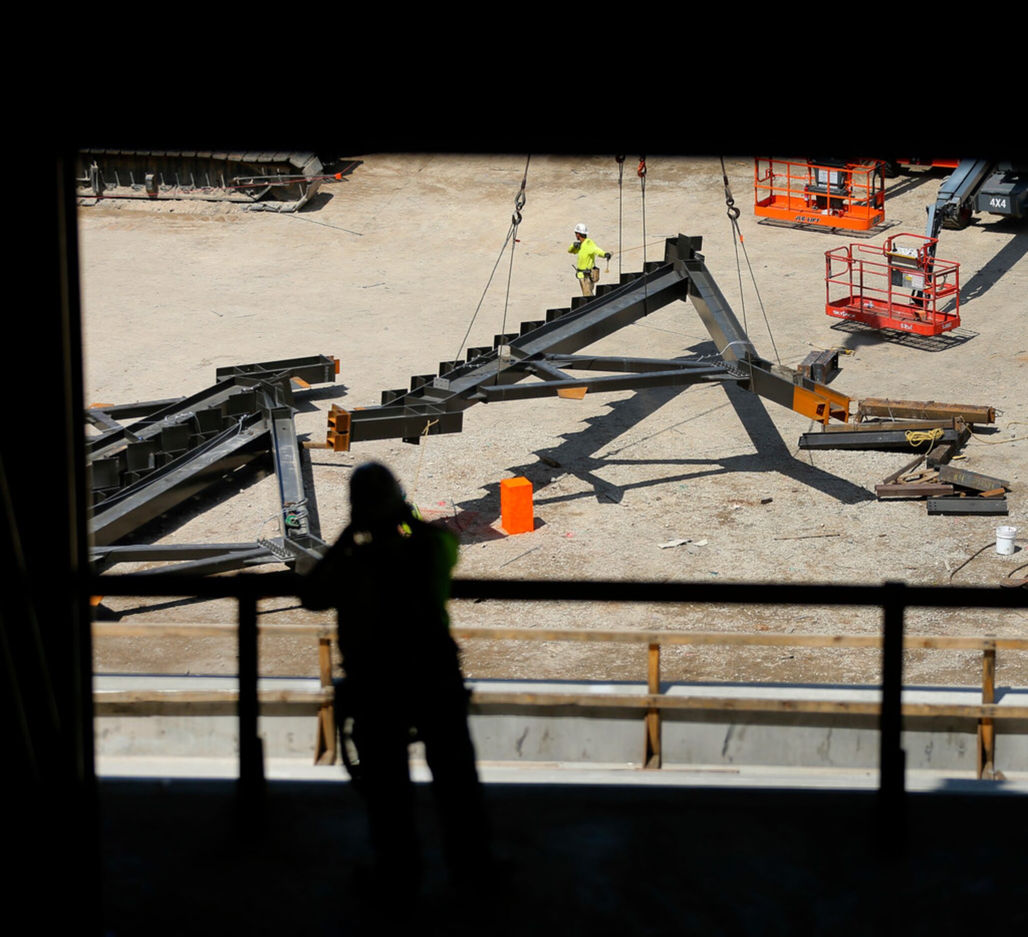 An orange concrete post (center) marks where first base will be at the new Globe Life Field...