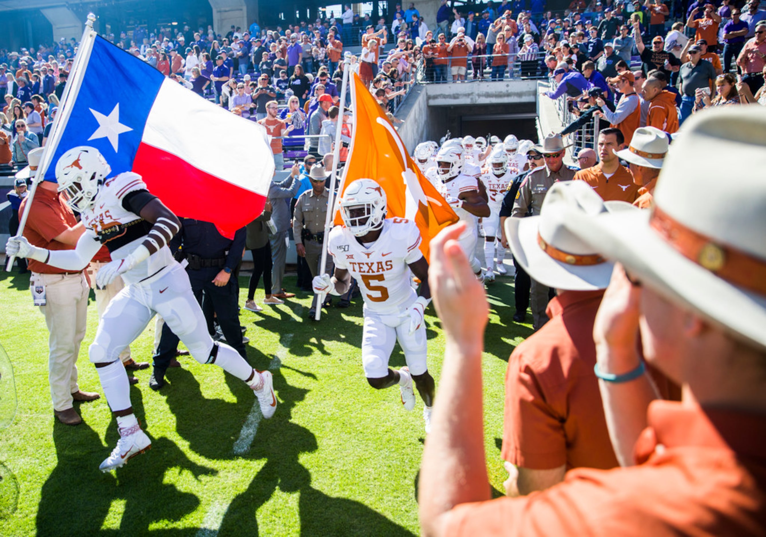 Texas Longhorns enter the field before an NCAA football game between the University of Texas...