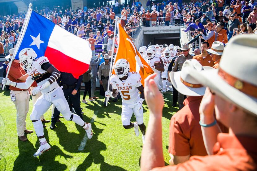 Texas Longhorns enter the field before an NCAA football game between the University of Texas...