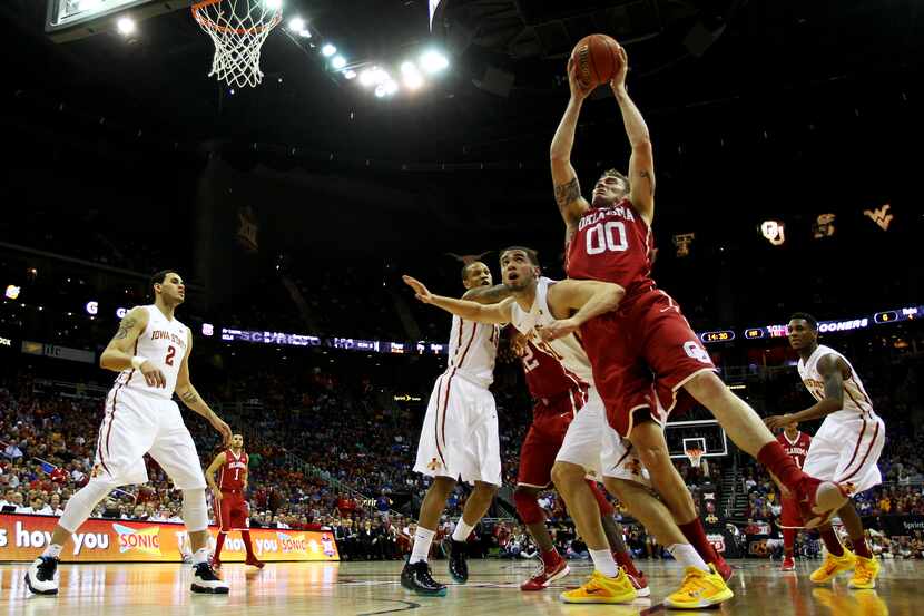 KANSAS CITY, MO - MARCH 13: Ryan Spangler #00 of the Oklahoma Sooners goes up against...