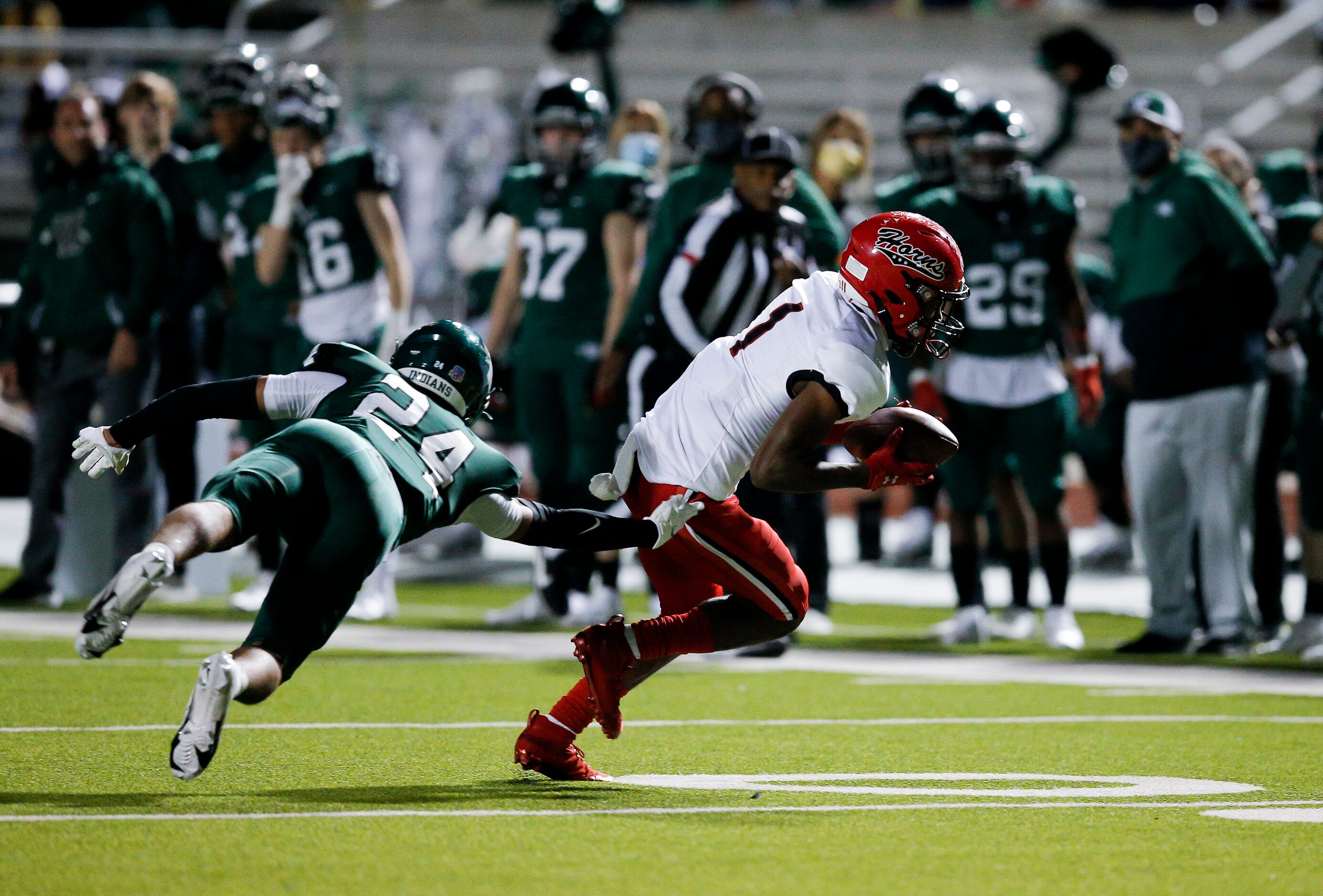 Cedar Hill senior wide receiver Anthony Thomas IV (1) breaks past Waxahachie senior...