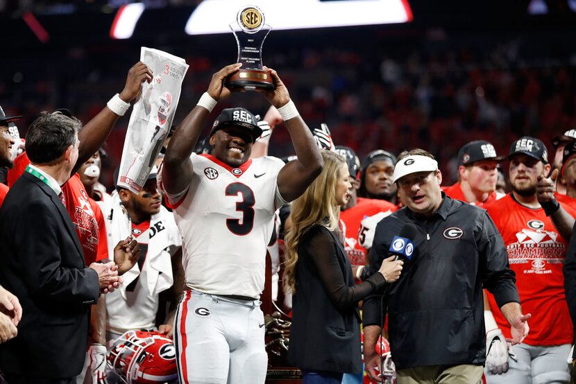 ATLANTA, GA - DECEMBER 02: Roquan Smith #3 of the Georgia Bulldogs reacts to winning the...