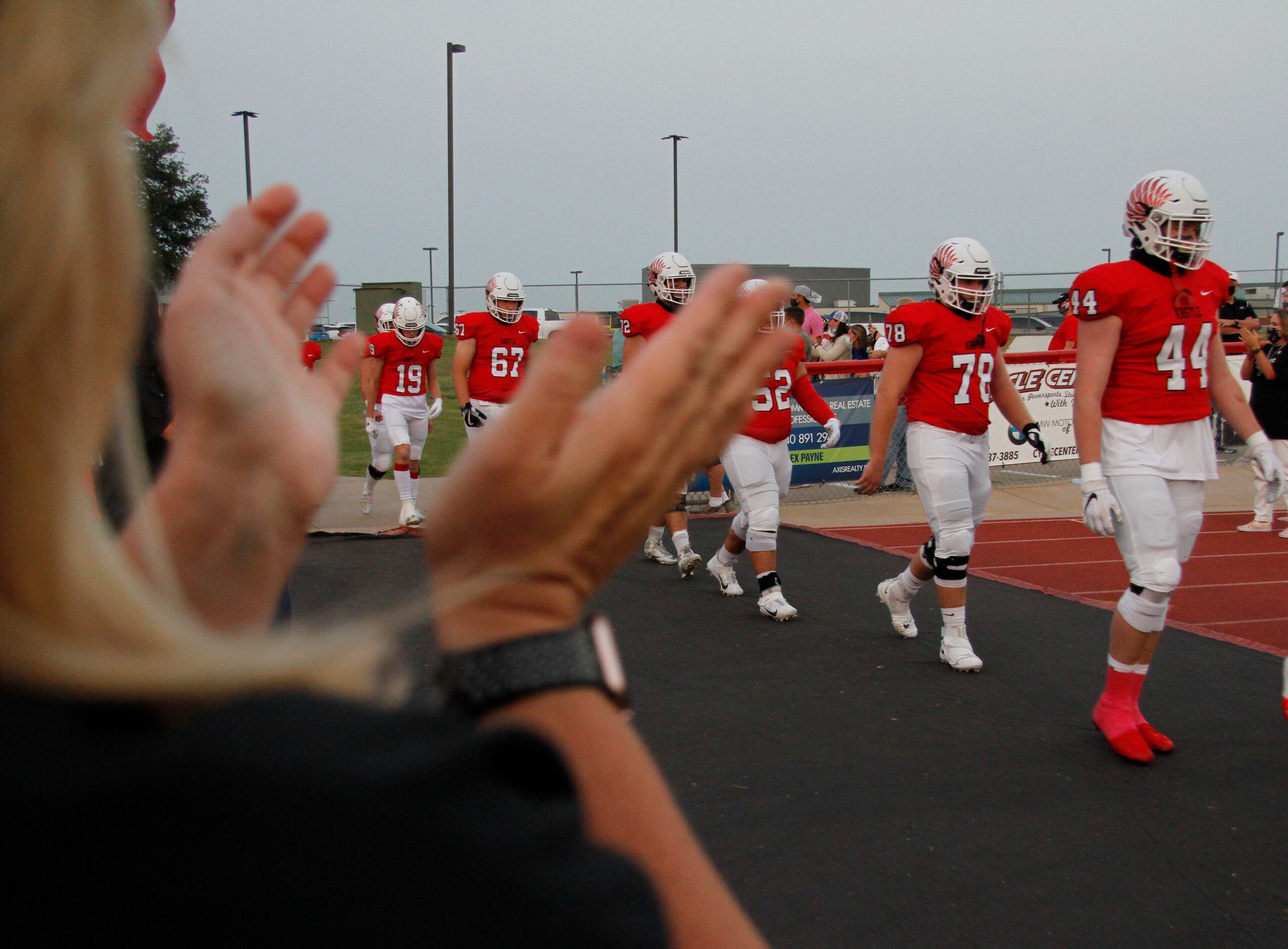 Argyle players walk onto the field to the applause of fans prior to the opening kickoff of...