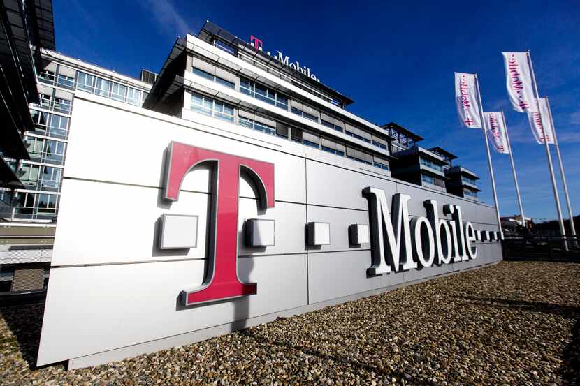 Bloomberg Photo Service 'Best of the Week': A logo for T-Mobile, operated by Deutsche...