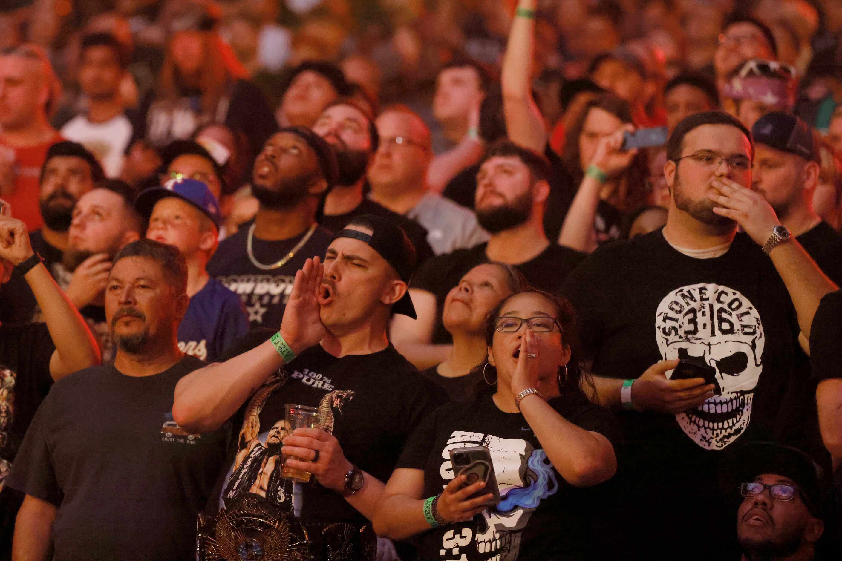 Fans cheer during WrestleMania in Arlington, Texas on Saturday, April 2, 2022. 