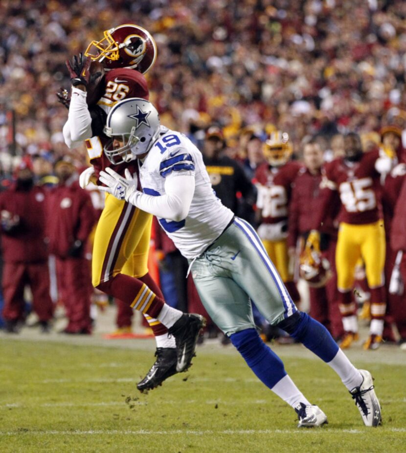 Washington Redskins cornerback Josh Wilson (26) intercepts a pass intended for Dallas...