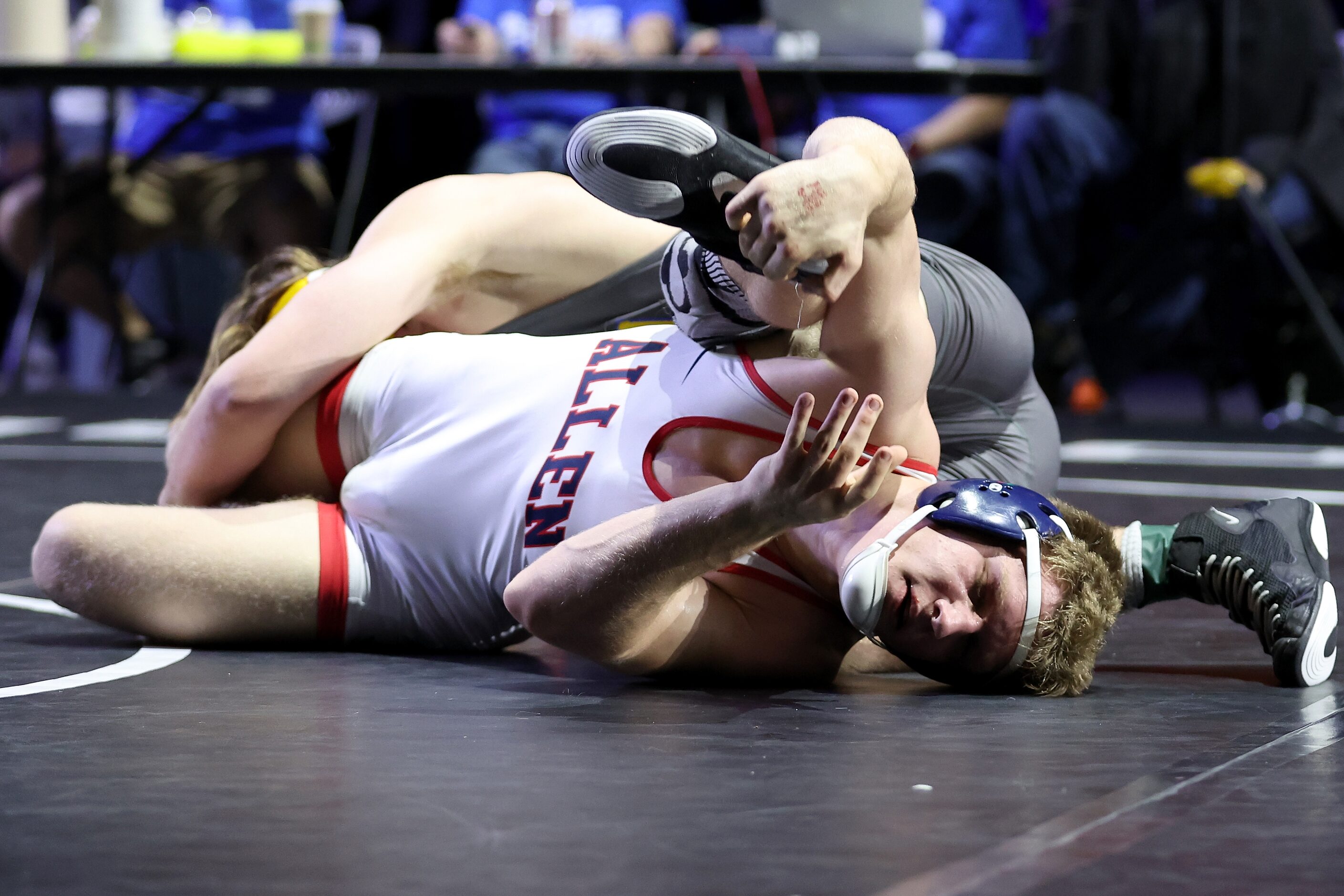 Aiden Cooley of Allen (white) competes against Isaac Sheeran of Klein during the Boys 6A...