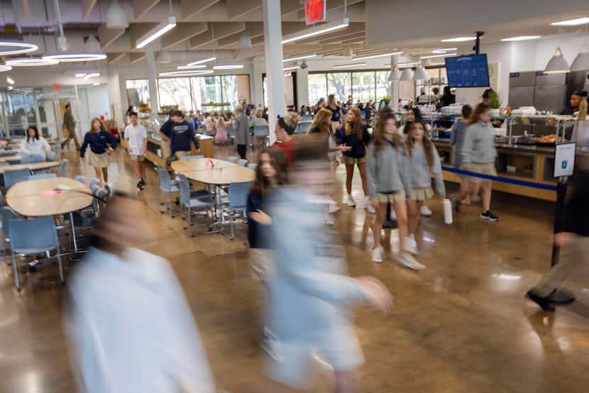 Students walk through the cafeteria at the Shelton School and Evaluation Center in Dallas on...
