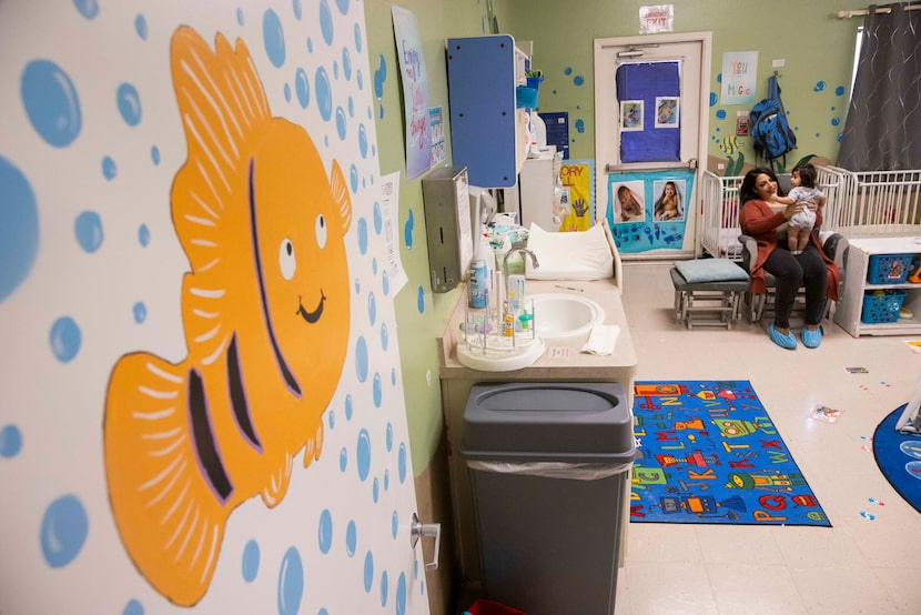 Mayra Ortiz and her son, Anthony, in his child care class at the Nexus Child Development...