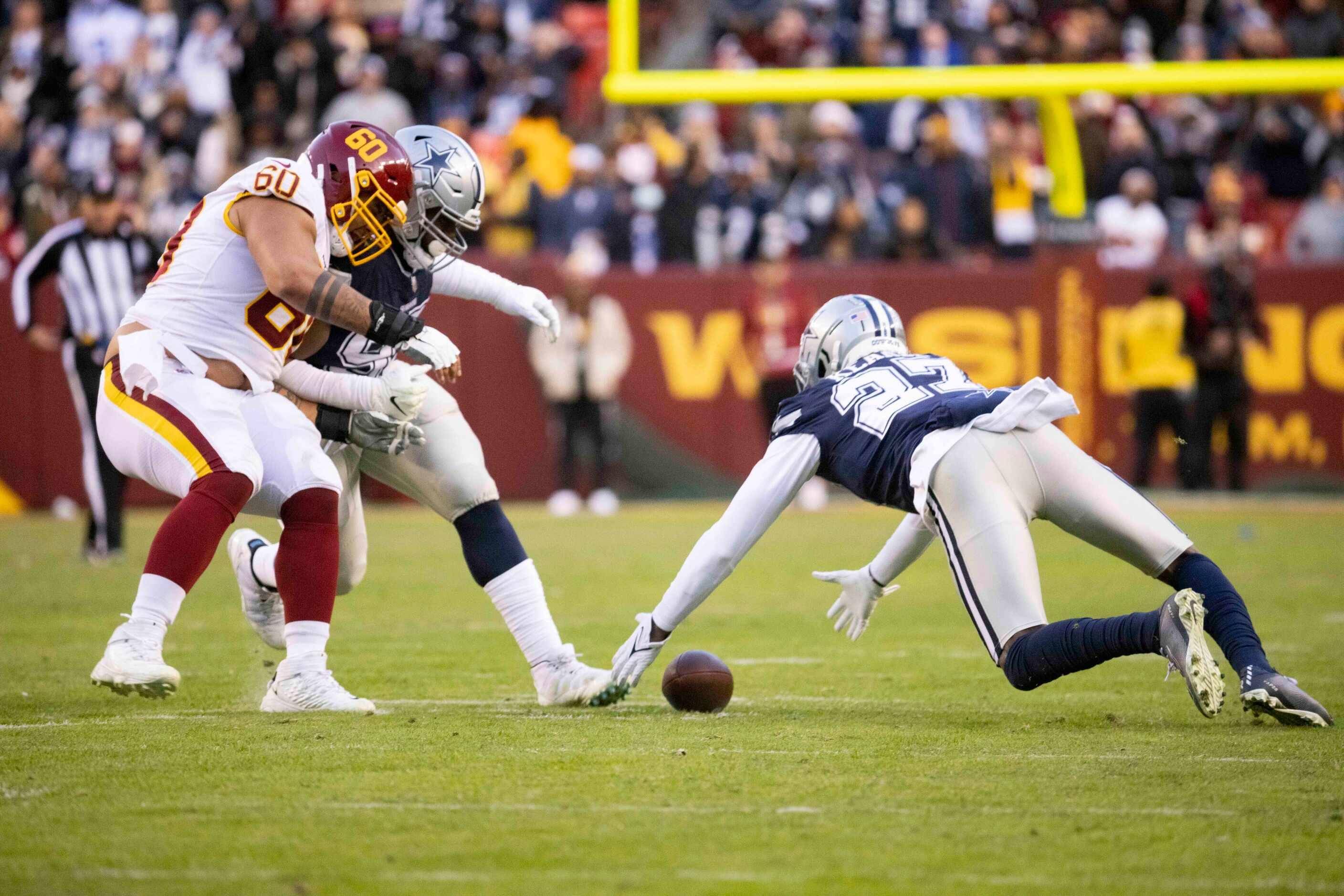 Dallas Cowboys safety Jayron Kearse (27) grabs the fumble by Washington Football Team...
