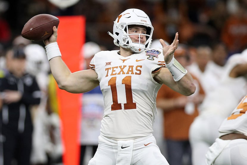 NEW ORLEANS, LOUISIANA - JANUARY 01:  Sam Ehlinger #11 of the Texas Longhorns throws a pass...