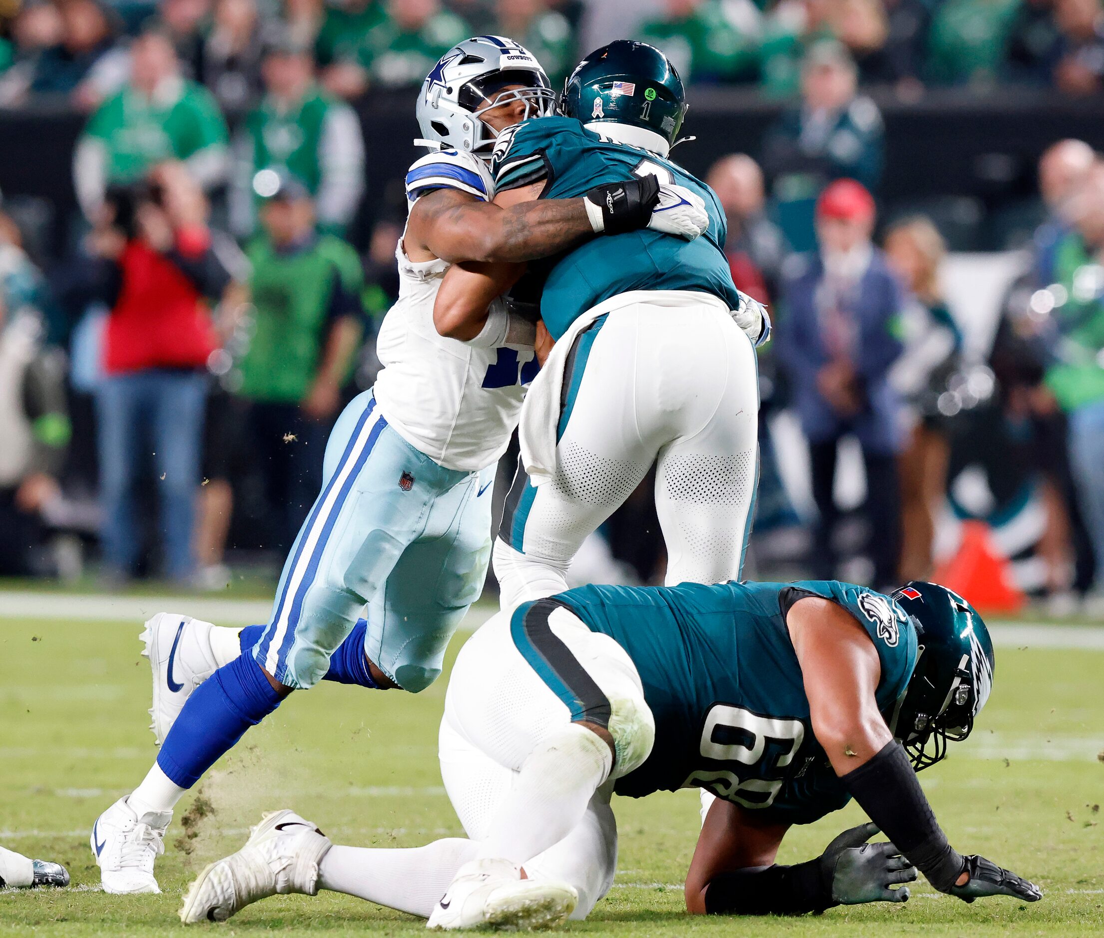 Dallas Cowboys linebacker Micah Parsons (11) sacks Philadelphia Eagles quarterback Jalen...