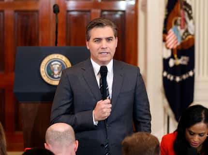 CNN journalist Jim Acosta does a standup before a news conference with President Donald...
