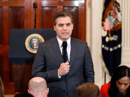 CNN journalist Jim Acosta does a standup before a news conference with President Donald...