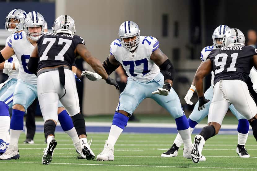 Dallas Cowboys offensive tackle Tyron Smith (77) started against the Las Vegas Raiders in...