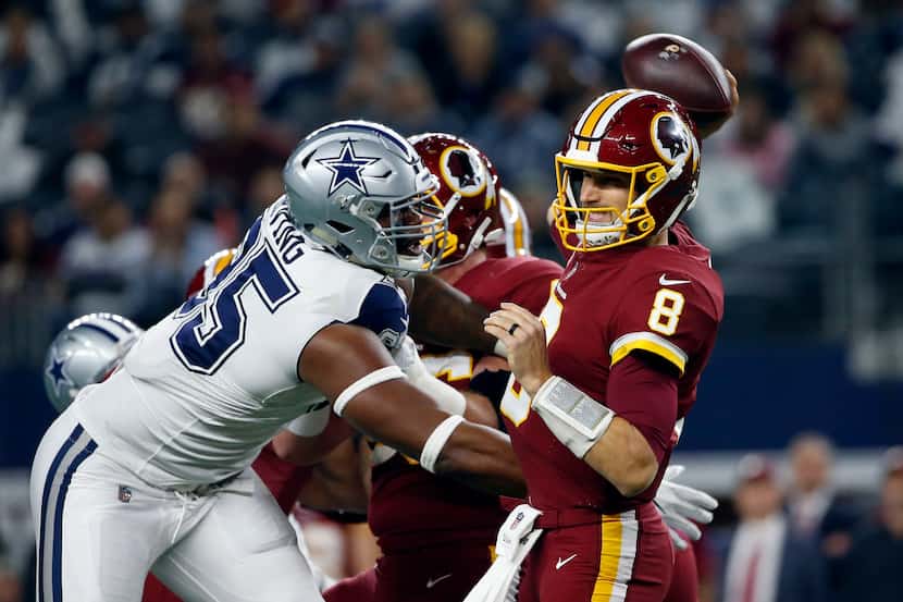 Dallas Cowboys defensive tackle David Irving (95) pressures Washington Redskins quarterback...
