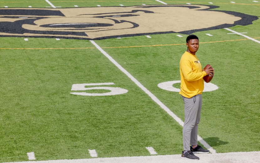 Former South Oak Cliff High School quarterback David Johnson stands for a portrait on the...