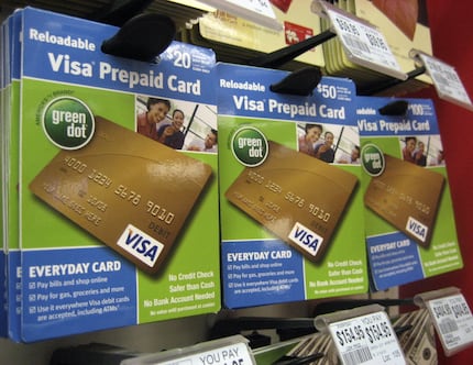 Visa prepaid cards at a drug store in New York. (AP Photo/Candice Choi)