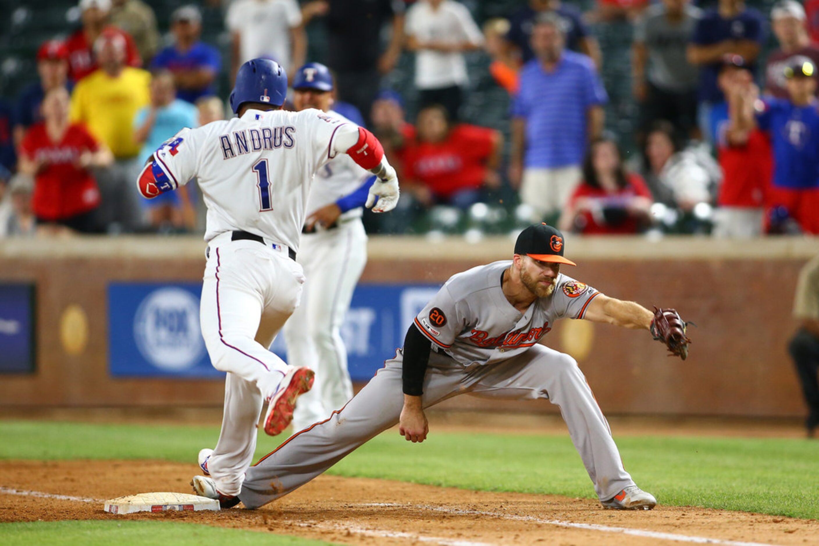 ARLINGTON, TX - JUNE 04: Chris Davis #19 of the Baltimore Orioles makes the out on Elvis...