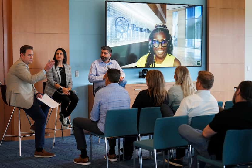In a sign of the times, Devonna Dee Kee participations on screen in a meeting at Fannie Mae...