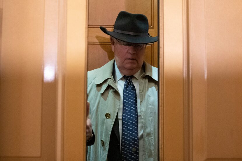 FILE - Ken Starr, an attorney for President Donald Trump, takes an elevator as he arrives on...