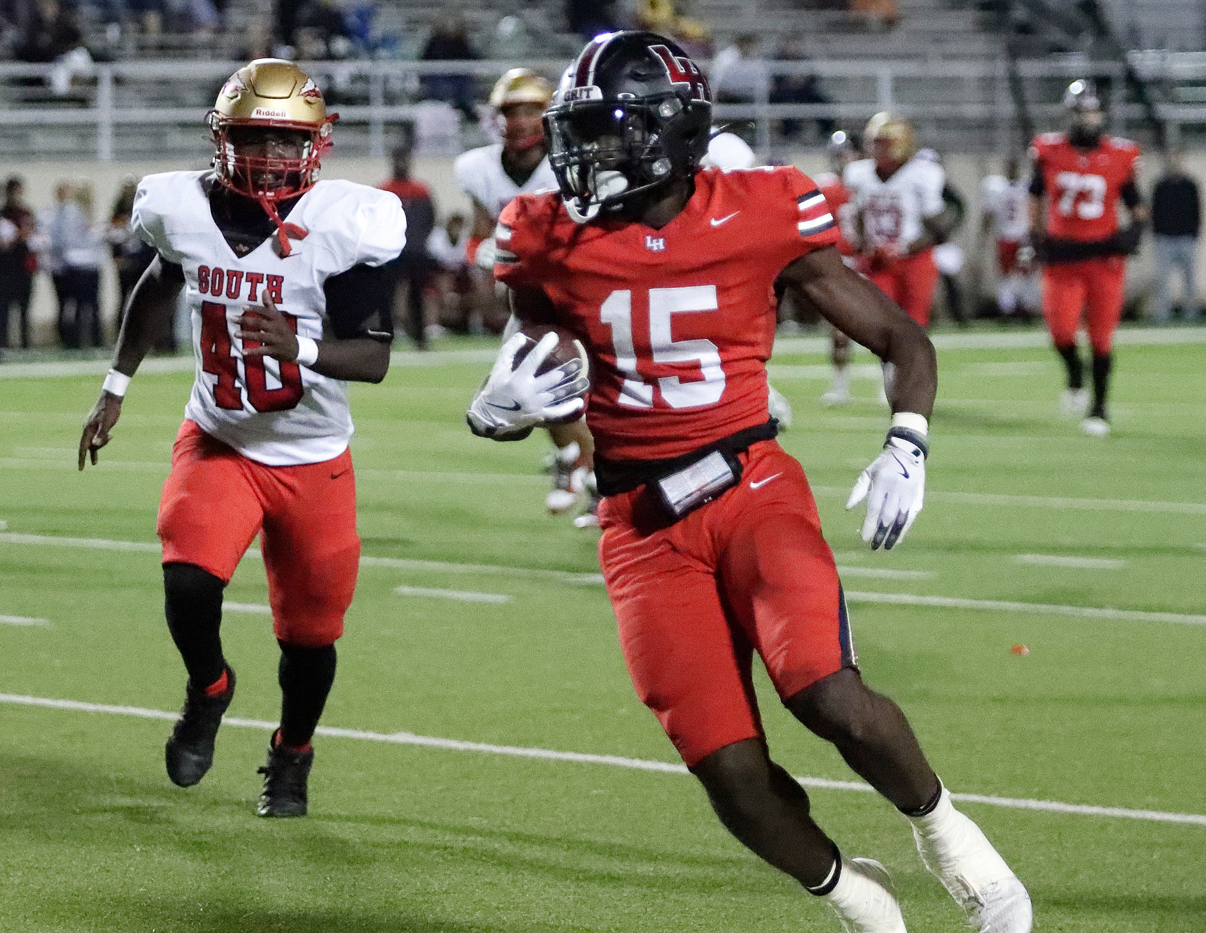 Lake Highlands High School running back Christian Rhodes (15) gets a big run during the...