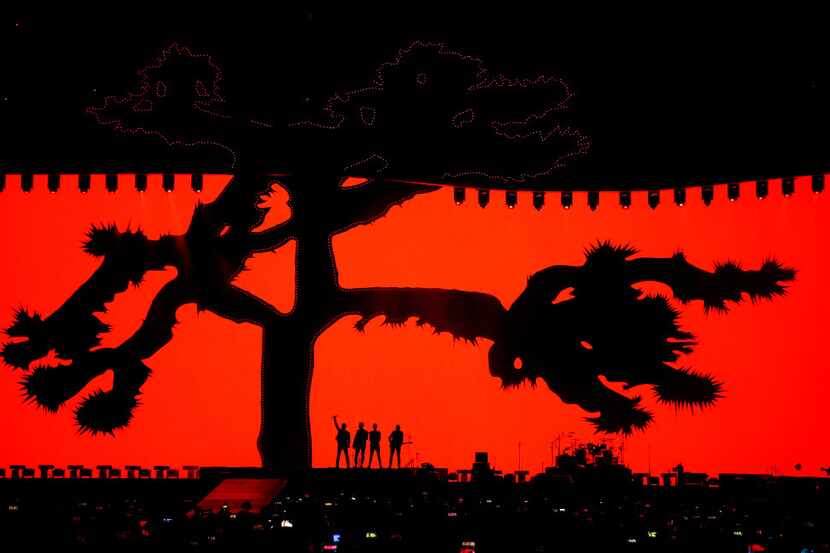Members of U2 perform on stage at AT&T Stadium in Arlington, Texas, Friday, May 26, 2017. 