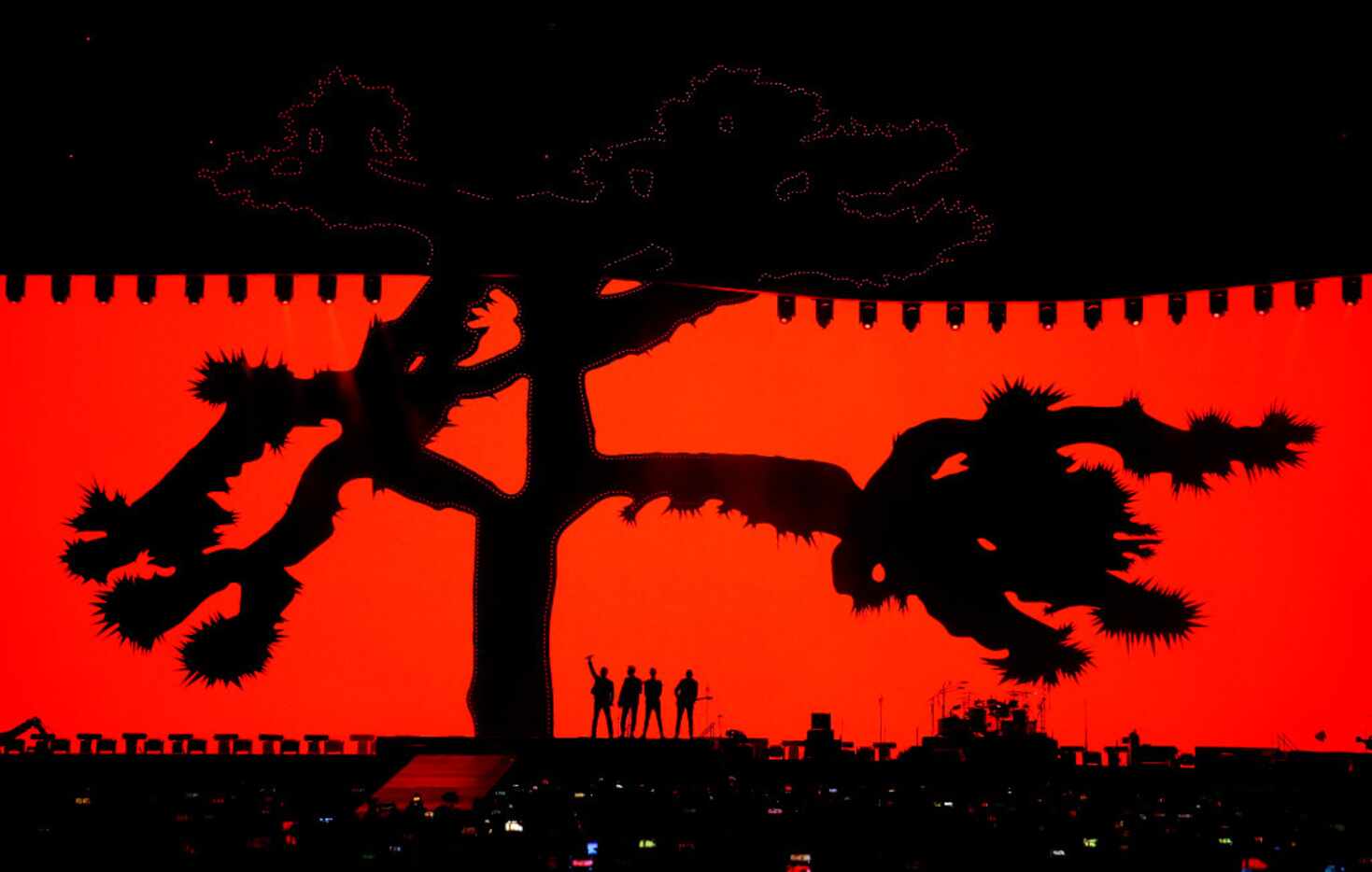 Members of U2 perform on stage at AT&T Stadium in Arlington, Texas, Friday, May 26, 2017. 