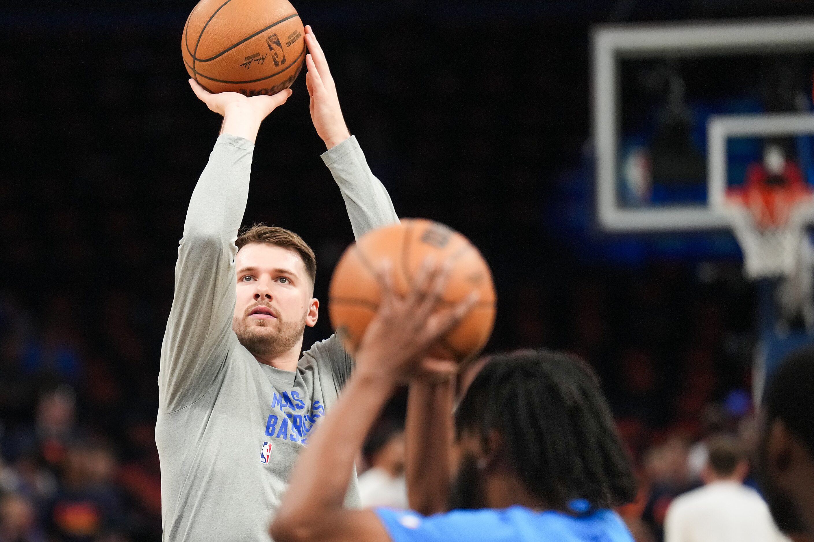 Dallas Mavericks guard Luka Doncic shoots free throws as he warms up before Game 5 of an NBA...