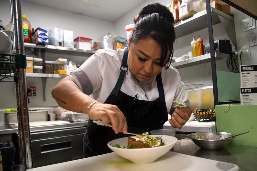 Chef  Anastacia Quiñones adds garnish to her favorite ceviche recipe at José restaurant in...