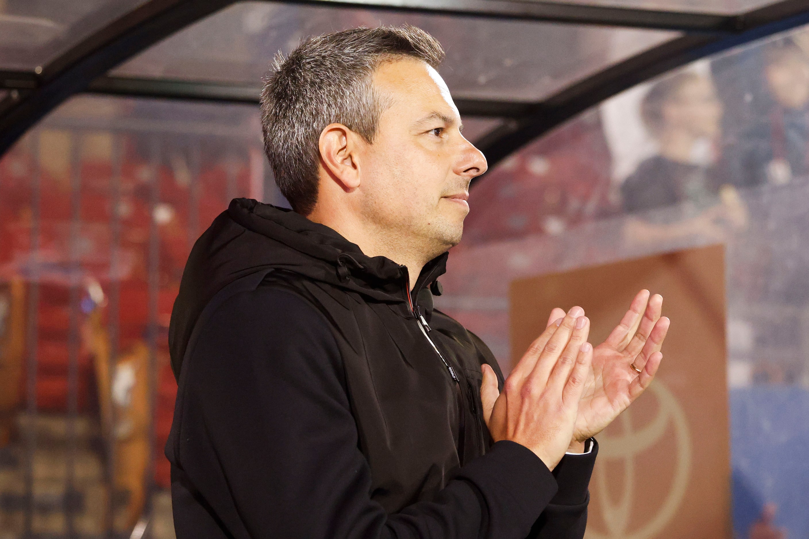 FC Dallas head coach Nico Estévez remains in the dugout ahead of an MLS soccer match against...