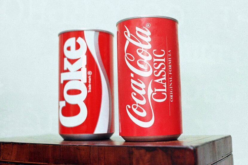In this 1985 file photo, cans of New Coke and Coca-Cola Classic are on display during a news...