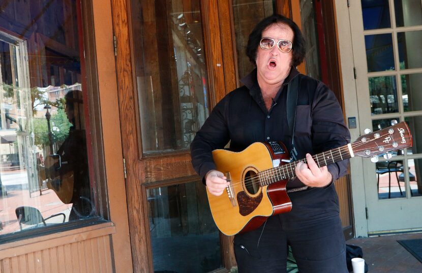 Phil Sneed makes his living street performing by Wild Bill's Western Store in the West End...