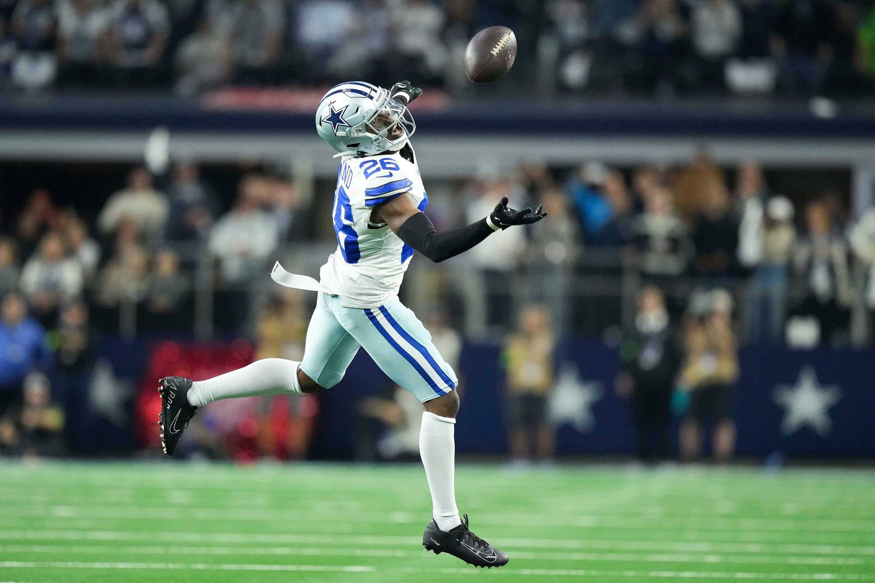 Dallas Cowboys cornerback DaRon Bland (26) nearly intercepts a pass by Seattle Seahawks...