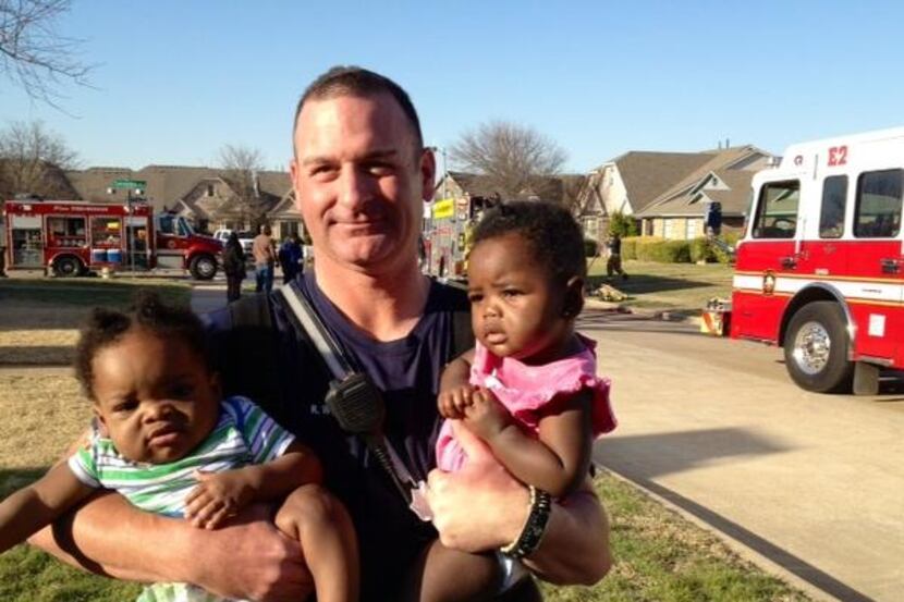 
Fire Apparatus Operator Randy Wood found the 9-month-old twins, whose names were not...