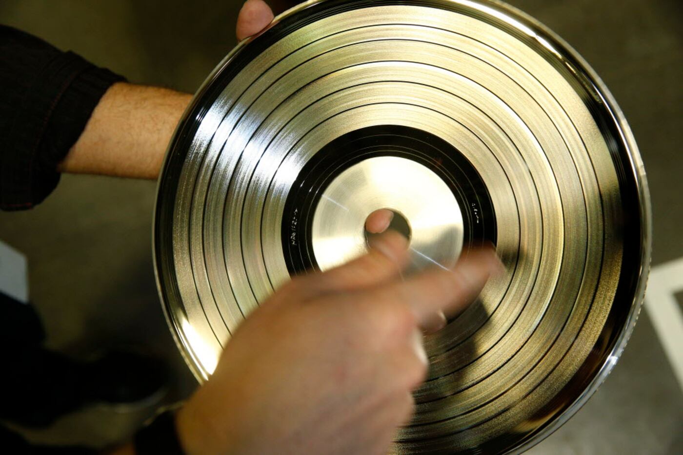 A metal master that is used to press records at Hand Drawn Pressing in Addison, Texas on...