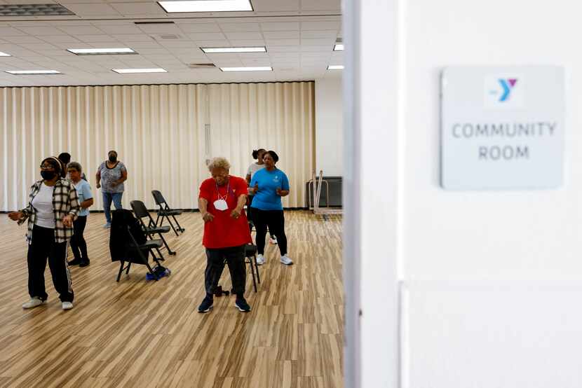 Participants take part in a line dancing session at Park South Family YMCA in Dallas.