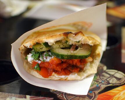 Falafel is made from deep-fried chick peas or fava beans. Falafel will be served inside a...