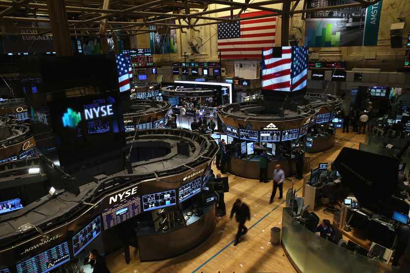 NEW YORK, NY - SEPTEMBER 16:  Traders work the floor of the New York Stock Exchange on...